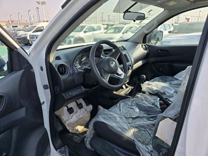 New Nissan Navara (Frontier) IV (D23), 2.3 l, 2024 in Dubai by Mohamed Hakim Motors, White color. Japanese Specs | AUTO.AE