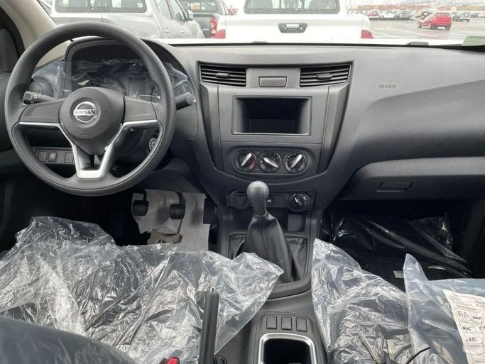 New Nissan Navara (Frontier) IV (D23), 2.5 l, 2022 in Dubai by Mohamed Hakim Motors, White color. GCC Specs | AUTO.AE