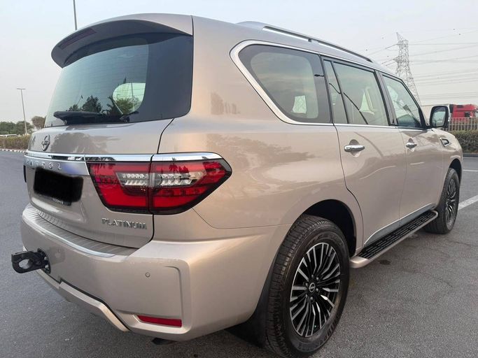 Used Nissan Patrol VI (Y62) Facelift 2, 4.0 l, 2022 in Dubai by Bin Turkeya Motors, Golden color. GCC Specs | AUTO.AE
