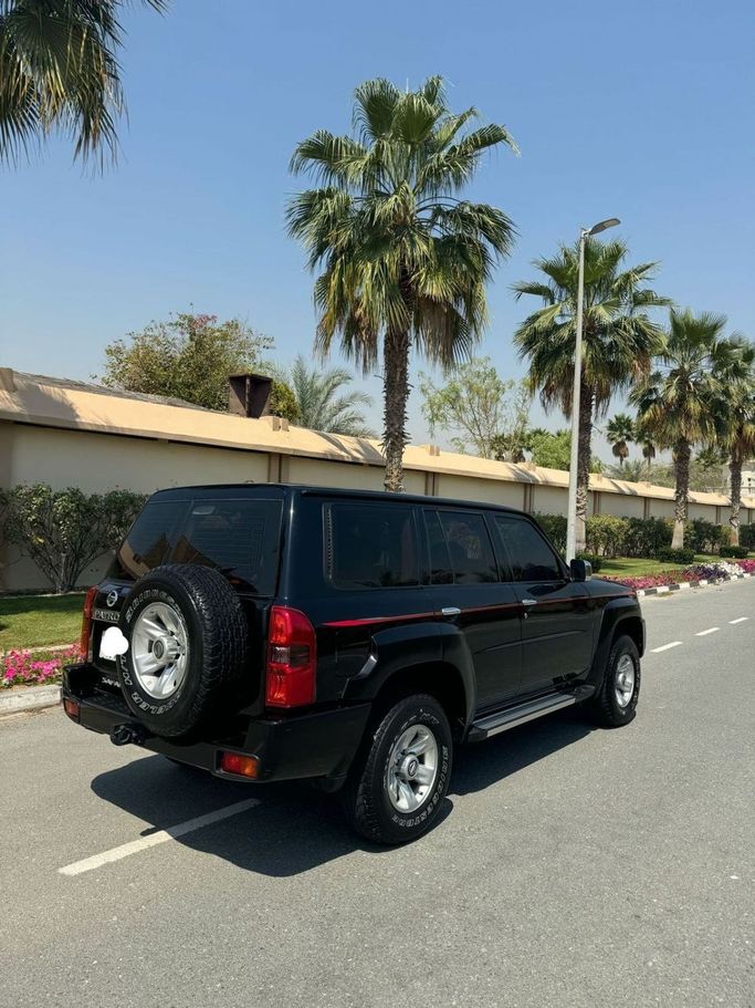Used Nissan Patrol V (Y61) Facelift, 4.8 l, 2023 in Dubai by Lahbab Motors, Black color. GCC Specs | AUTO.AE