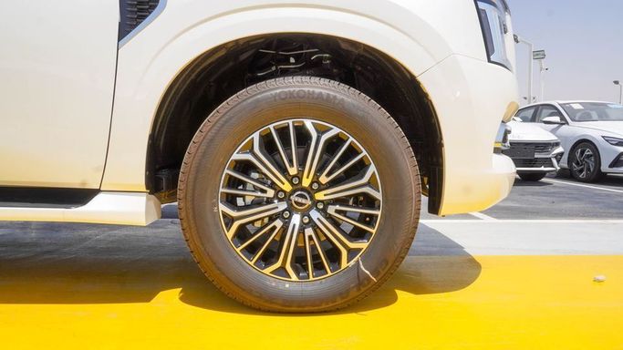 New Nissan Patrol VII (Y63), 3.5 l, 2025 in Dubai by Najem Motors, White color. GCC Specs | AUTO.AE