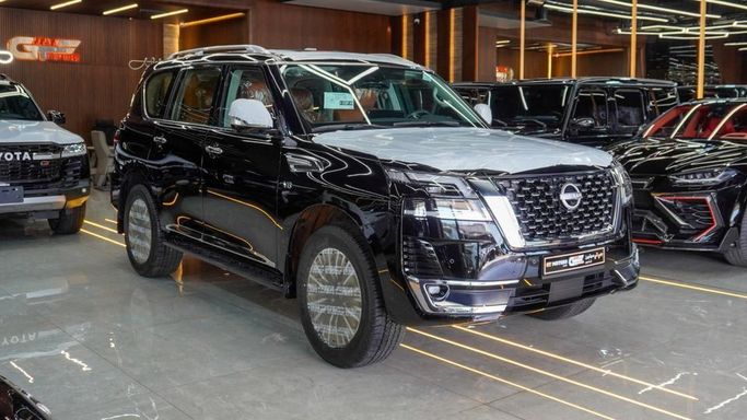 Новый Nissan Patrol VI (Y62) Рестайлинг 2, 5.6 л, 2024 в Дубае от Najem Motors Черный цвет. GCC | AUTO.AE