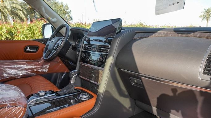 Новый Nissan Patrol VI (Y62) Рестайлинг 2, 5.6 л, 2024 в Дубае от Najem Motors Черный цвет. GCC | AUTO.AE