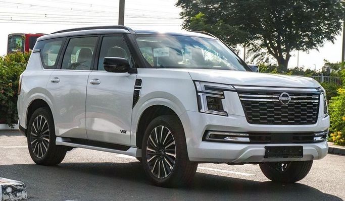 New Nissan Patrol VII (Y63), 3.8 l, 2025 in Dubai by Najem Motors, White color. GCC Specs | AUTO.AE