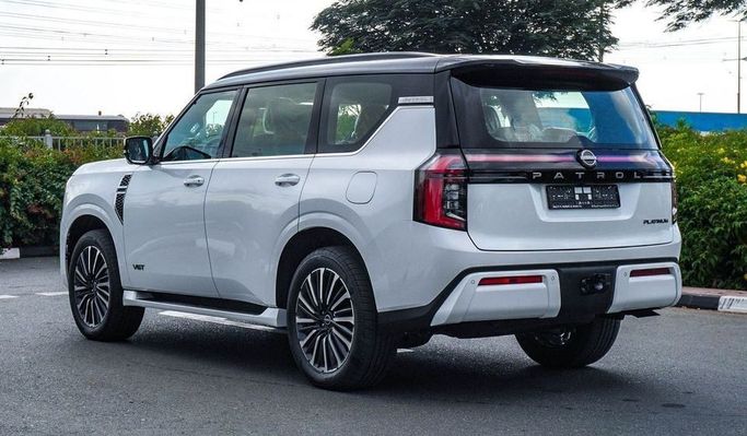 New Nissan Patrol VII (Y63), 3.8 l, 2025 in Dubai by Najem Motors, White color. GCC Specs | AUTO.AE