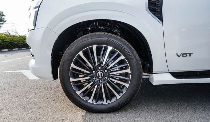 New Nissan Patrol VII (Y63), 3.8 l, 2025 in Dubai by Najem Motors, White color. GCC Specs | AUTO.AE