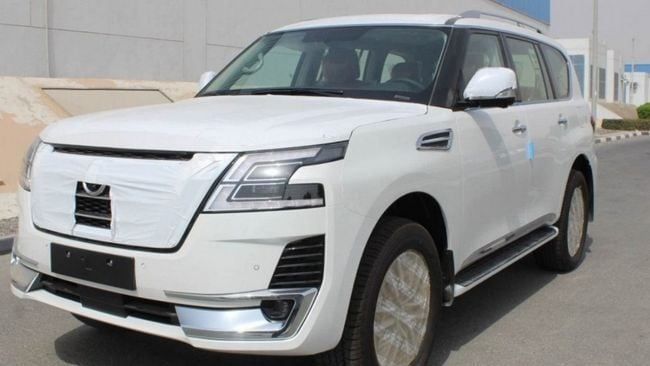 New Nissan Patrol VI (Y62) Facelift 2, 4.0 l, 2023 in Dubai by Falcons GT Motors FZCO, White color. GCC Specs | AUTO.AE