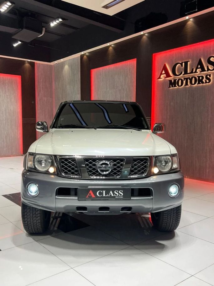 Used Nissan Patrol V (Y61) Facelift, 4.8 l, 2019 in Dubai by A Class Motors, White color.  | AUTO.AE