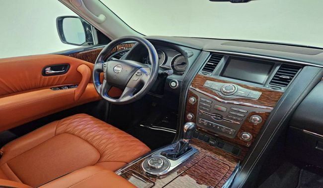 Used Nissan Patrol VI (Y62) Facelift, 5.6 l, 2016 in Dubai by Gulf Motors, White color. GCC Specs | AUTO.AE