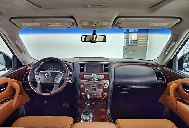 Used Nissan Patrol VI (Y62) Facelift, 5.6 l, 2015 in Dubai by Gulf Motors, White color. GCC Specs | AUTO.AE