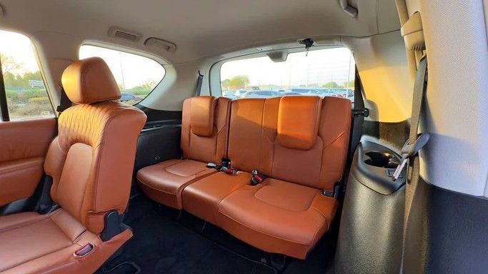 Подержанный Nissan Patrol VI (Y62) Рестайлинг 2, 4.0 л, 2024 в Дубае от Q Motors Белый цвет. GCC | AUTO.AE