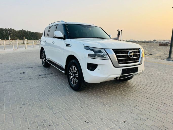 Подержанный Nissan Patrol VI (Y62) Рестайлинг 2, 4.0 л, 2021 в Дубае от Al Balora Al Bayda Used Cars Белый цвет. Other | AUTO.AE