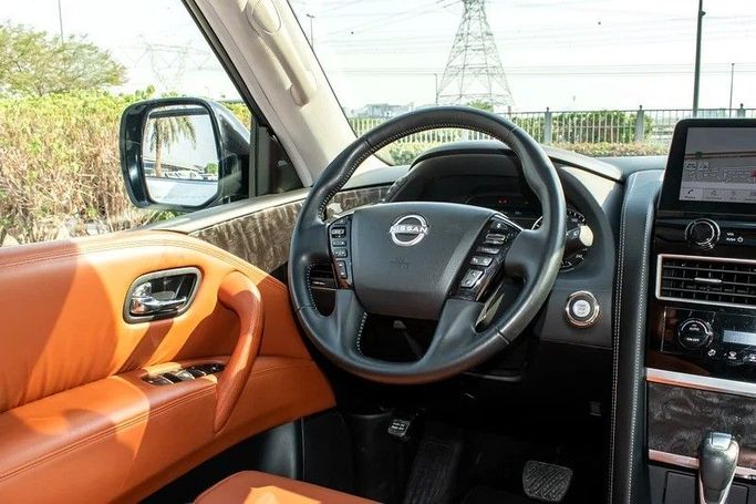 Подержанный Nissan Patrol VI (Y62) Рестайлинг 2, 4.0 л, 2023 в Дубае от AG Motors Белый цвет. GCC | AUTO.AE