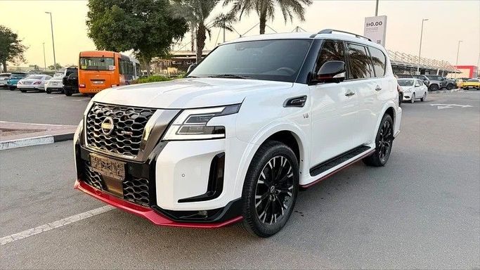 Подержанный Nissan Patrol VI (Y62) Рестайлинг 2, 5.6 л, 2023 в Дубае от AG Motors Белый цвет. GCC | AUTO.AE