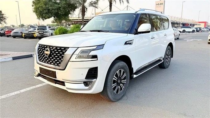 Подержанный Nissan Patrol VI (Y62) Рестайлинг 2, 4.0 л, 2023 в Дубае от AG Motors Белый цвет. GCC | AUTO.AE
