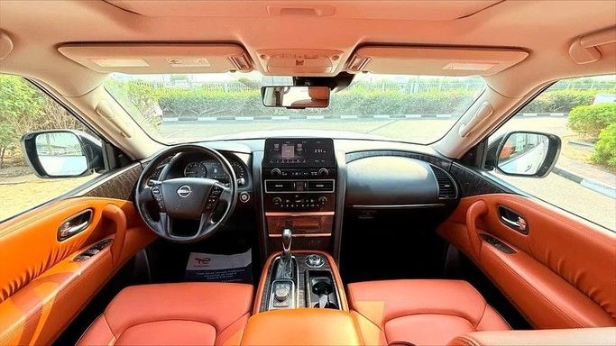 Подержанный Nissan Patrol VI (Y62) Рестайлинг 2, 4.0 л, 2023 в Дубае от AG Motors Белый цвет. GCC | AUTO.AE