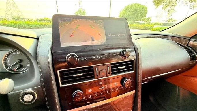 Подержанный Nissan Patrol VI (Y62) Рестайлинг 2, 4.0 л, 2023 в Дубае от AG Motors Белый цвет. GCC | AUTO.AE