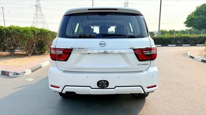 Подержанный Nissan Patrol VI (Y62) Рестайлинг 2, 4.0 л, 2023 в Дубае от AG Motors Белый цвет. GCC | AUTO.AE