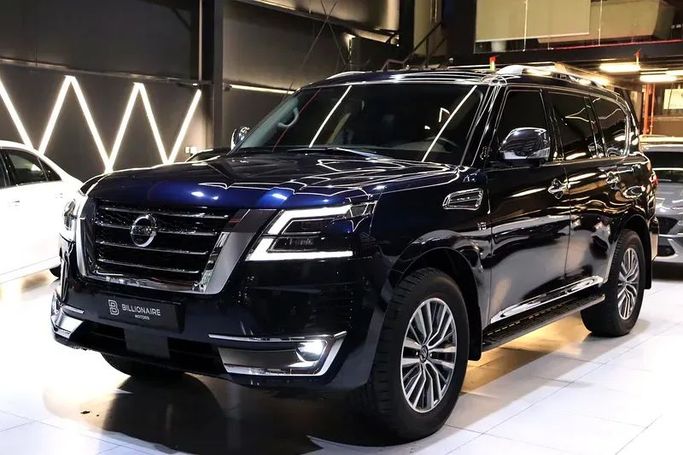 Подержанный Nissan Patrol VI (Y62) Рестайлинг 2, 5.6 л, 2021 в Дубае от Billionaire Motors Синий цвет. GCC | AUTO.AE