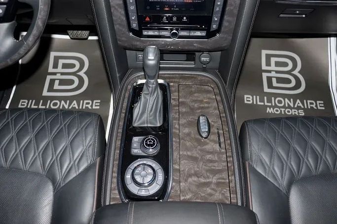 Подержанный Nissan Patrol VI (Y62) Рестайлинг 2, 5.6 л, 2021 в Дубае от Billionaire Motors Синий цвет. GCC | AUTO.AE