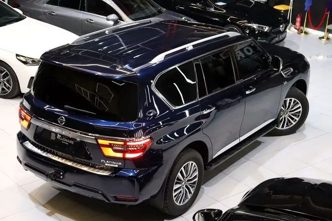 Подержанный Nissan Patrol VI (Y62) Рестайлинг 2, 5.6 л, 2021 в Дубае от Billionaire Motors Синий цвет. GCC | AUTO.AE