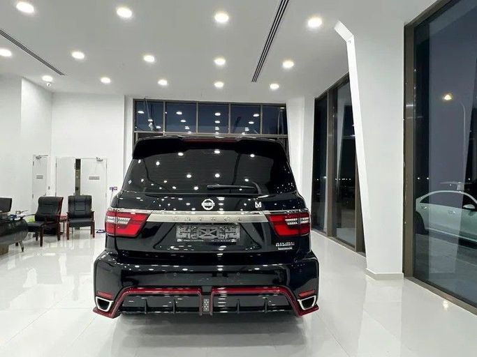 Подержанный Nissan Patrol VI (Y62) Рестайлинг 2, 5.6 л, 2021 в Дубае от The One Motors Черный цвет. GCC | AUTO.AE