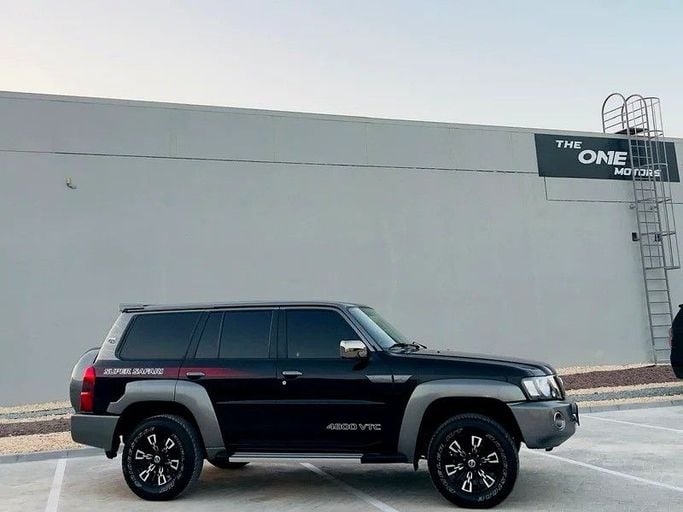 Подержанный Nissan Patrol V (Y61) Рестайлинг, 4.8 л, 2024 в Дубае от The One Motors Черный цвет. GCC | AUTO.AE