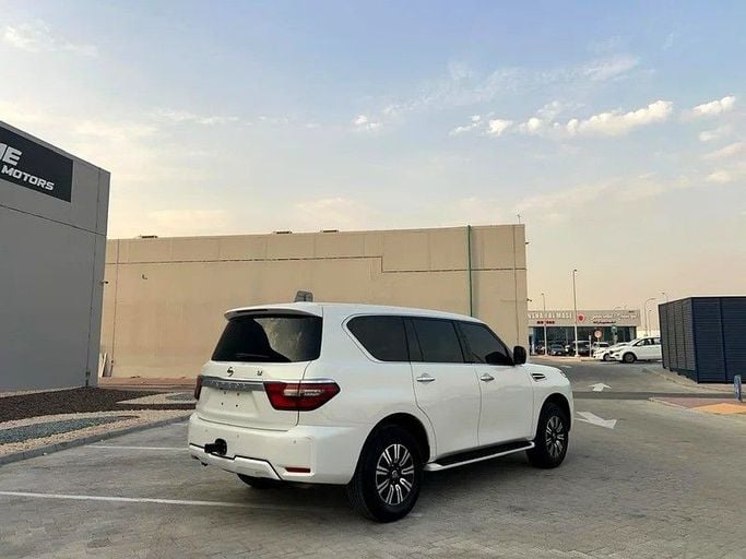 Подержанный Nissan Patrol VI (Y62) Рестайлинг 2, 4.0 л, 2020 в Дубае от The One Motors Белый цвет. GCC | AUTO.AE