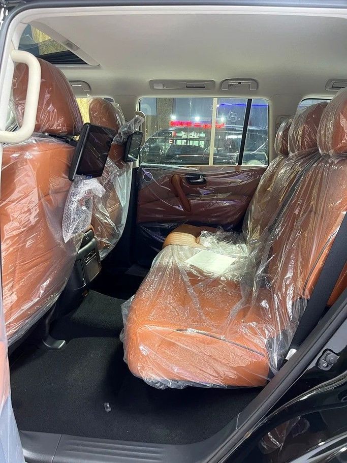 New Nissan Patrol VI (Y62) Facelift 2, 4.0 l, 2024 in Dubai by Al Borj Motors, Black color. GCC Specs | AUTO.AE