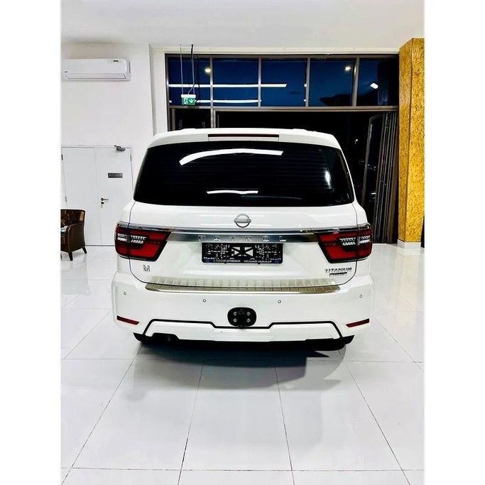 Used Nissan Patrol VI (Y62) Facelift 2, 5.6 l, 2024 in Dubai by Al Borj Motors, White color. GCC Specs | AUTO.AE