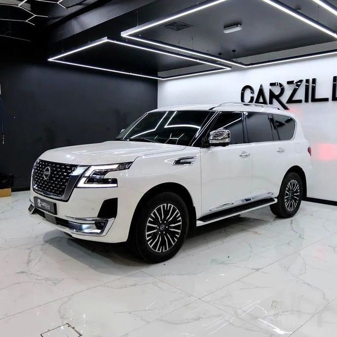 Used Nissan Patrol VI (Y62) Facelift 2, 4.0 l, 2022 in Dubai by Carzilla Motors, White color. GCC Specs | AUTO.AE