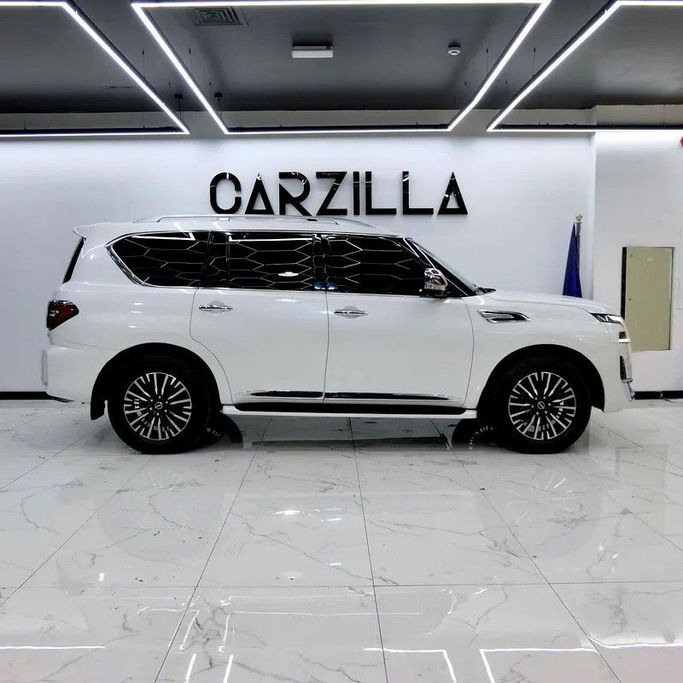 Used Nissan Patrol VI (Y62) Facelift 2, 4.0 l, 2022 in Dubai by Carzilla Motors, White color. GCC Specs | AUTO.AE