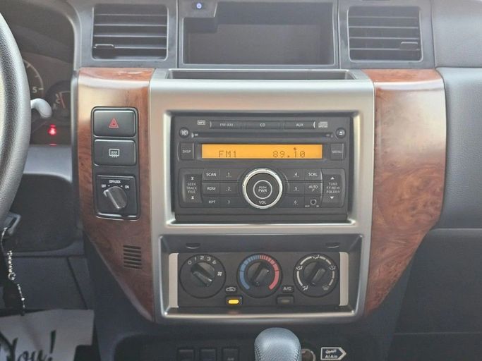 Подержанный Nissan Patrol V (Y61) Рестайлинг, 4.8 л, 2023 в Дубае от US Motors Черный цвет. GCC | AUTO.AE