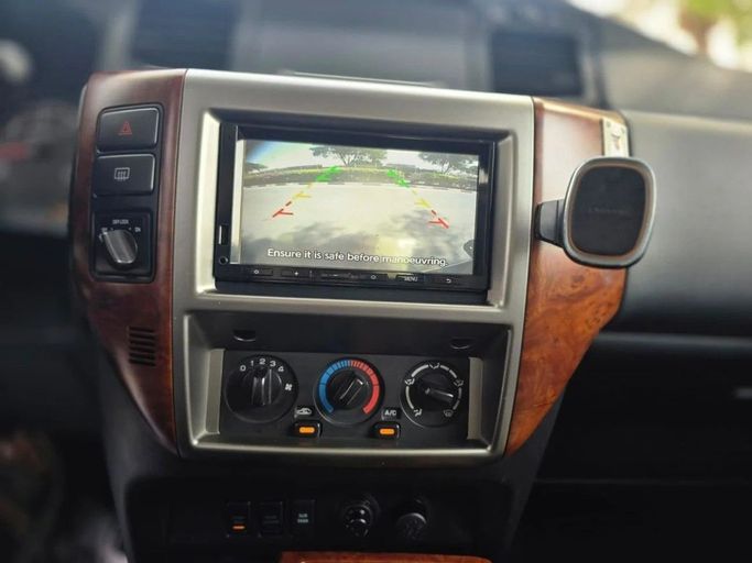 Used Nissan Patrol V (Y61) Facelift, 4.8 l, 2021 in Dubai by US Motors, White color. GCC Specs | AUTO.AE