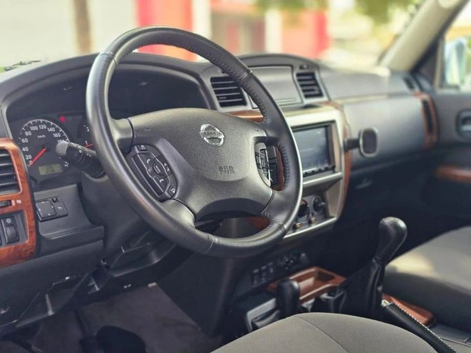 Used Nissan Patrol V (Y61) Facelift, 4.8 l, 2021 in Dubai by US Motors, White color. GCC Specs | AUTO.AE