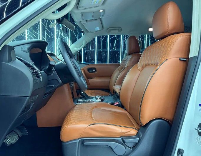 Used Nissan Patrol VI (Y62) Facelift 2, 4.0 l, 2024 in Dubai by Zeus Motors, White color. GCC Specs | AUTO.AE