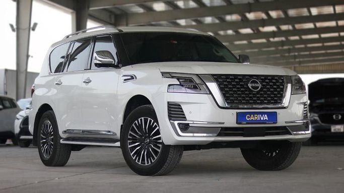 Used Nissan Patrol VI (Y62) Facelift 2, 4.0 l, 2022 in Dubai by Cariva Used Cars , White color. GCC Specs | AUTO.AE