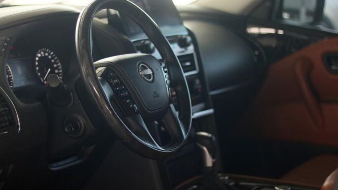 Used Nissan Patrol VI (Y62) Facelift 2, 4.0 l, 2022 in Dubai by Cariva Used Cars , White color. GCC Specs | AUTO.AE