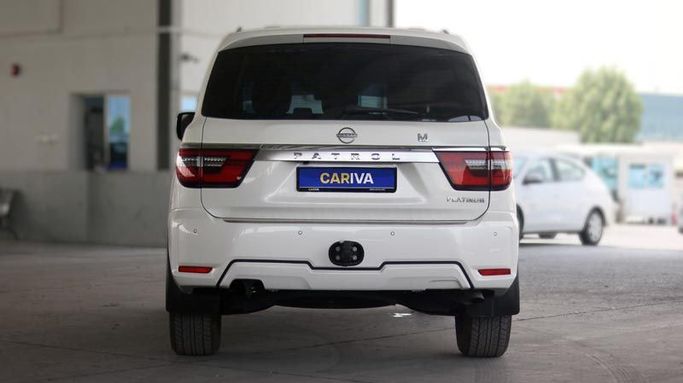 Used Nissan Patrol VI (Y62) Facelift 2, 4.0 l, 2022 in Dubai by Cariva Used Cars , White color. GCC Specs | AUTO.AE
