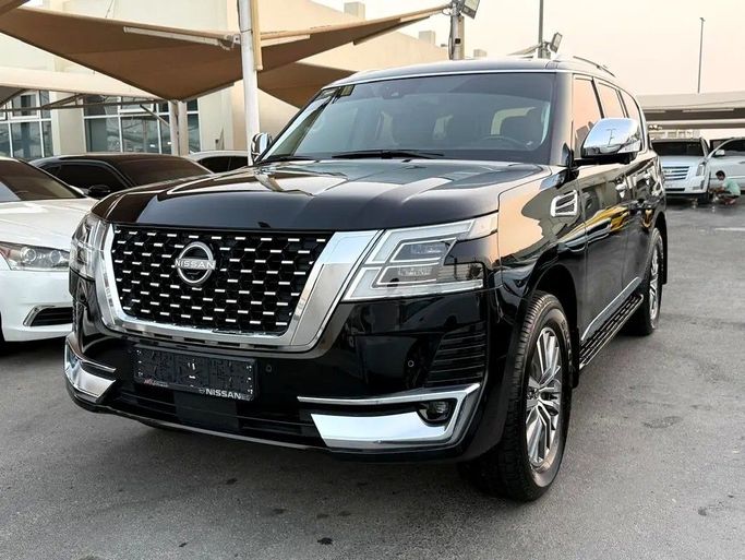 Подержанный Nissan Patrol VI (Y62) Рестайлинг 2, 4.0 л, 2021 в Дубае от Al Qemah Used Cars Черный цвет. GCC | AUTO.AE