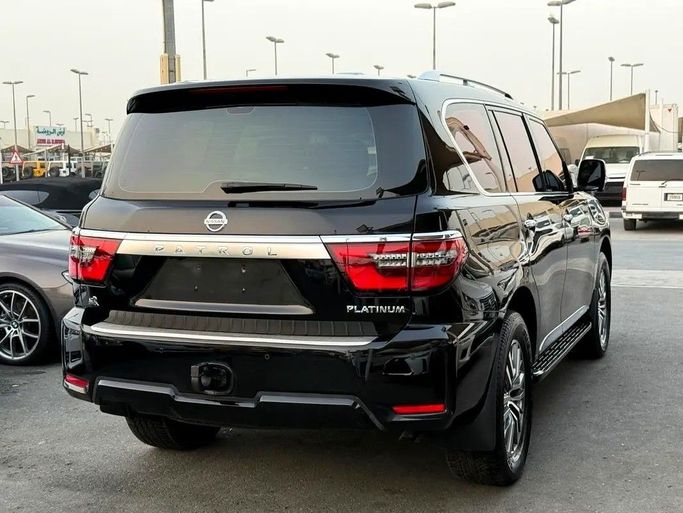Подержанный Nissan Patrol VI (Y62) Рестайлинг 2, 4.0 л, 2021 в Дубае от Al Qemah Used Cars Черный цвет. GCC | AUTO.AE