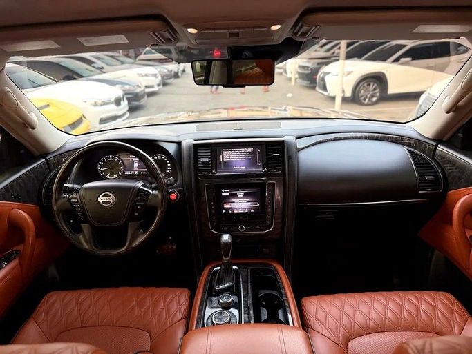 Подержанный Nissan Patrol VI (Y62) Рестайлинг 2, 4.0 л, 2021 в Дубае от Al Qemah Used Cars Черный цвет. GCC | AUTO.AE