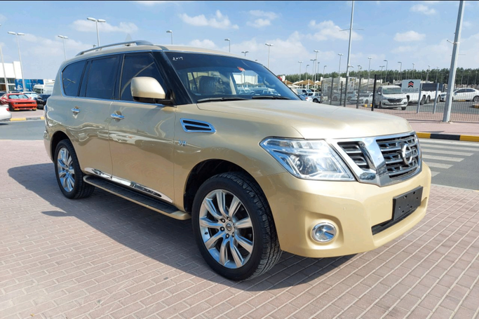 Used Nissan Patrol VI (Y62) Facelift, 5.6 l, 2019 in Dubai by Abdo Al Muthanna Used Cars, Golden color. GCC Specs | AUTO.AE