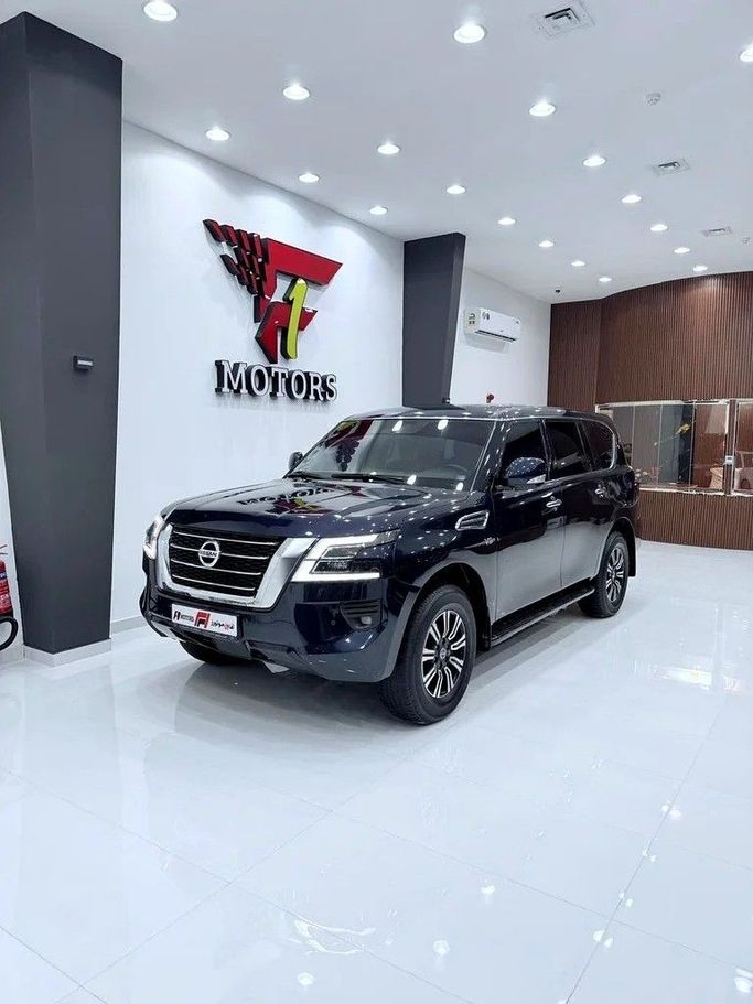 Подержанный Nissan Patrol VI (Y62) Рестайлинг 2, 5.6 л, 2021 в Дубае от F1 Motors Тёмно-синий цвет. GCC | AUTO.AE