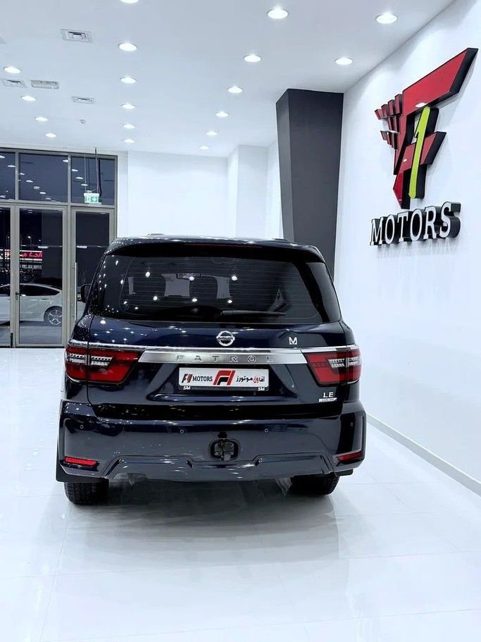 Подержанный Nissan Patrol VI (Y62) Рестайлинг 2, 5.6 л, 2021 в Дубае от F1 Motors Тёмно-синий цвет. GCC | AUTO.AE