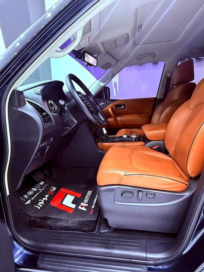 Подержанный Nissan Patrol VI (Y62) Рестайлинг 2, 5.6 л, 2021 в Дубае от F1 Motors Тёмно-синий цвет. GCC | AUTO.AE