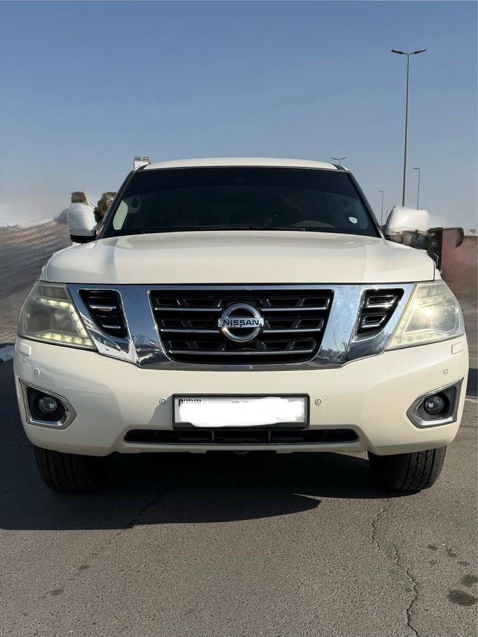 Подержанный Nissan Patrol VI (Y62) Рестайлинг, 5.6 л, 2016 в Дубае Белый цвет. GCC | AUTO.AE