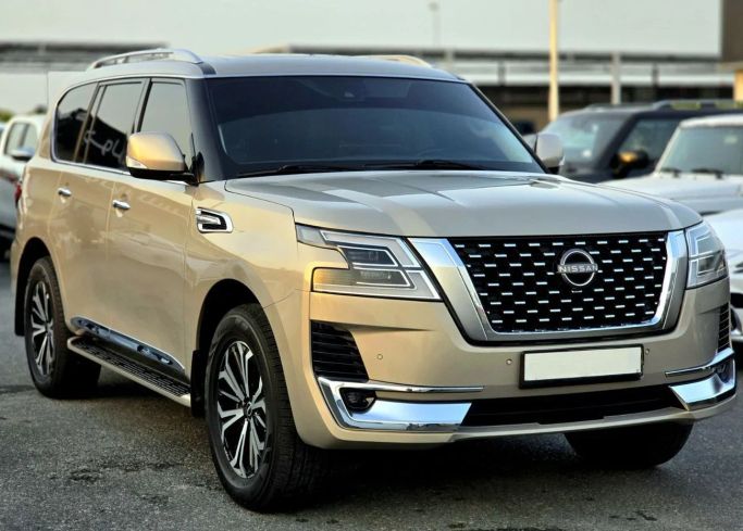 مستعملة Nissan Patrol عملية شد الوجه VI (Y62) 2, 5.6 l, 2022 في في دبي من Gulzar Motors FZE، اللون ذهبي. مواصفات الخليج | AUTO.AE