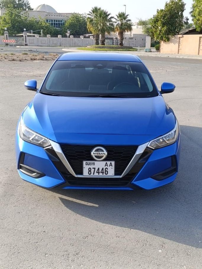 Nissan Sentra VIII (B18), 2021  sedan for rent in Dubai by more rent a car, blue color | AUTO.AE
