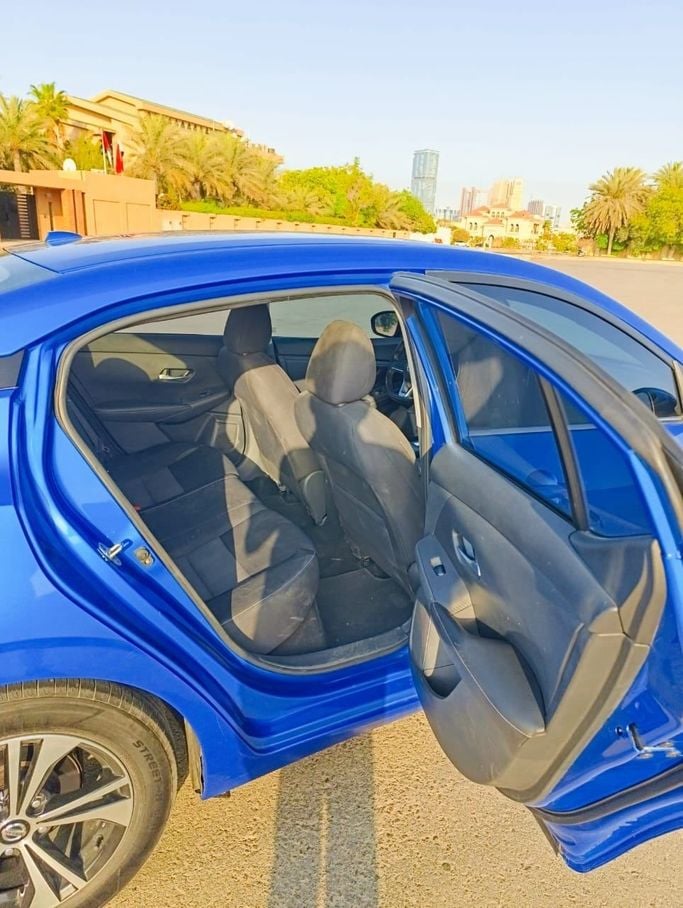 Nissan Sentra VIII (B18), 2021  sedan for rent in Dubai by more rent a car, blue color | AUTO.AE